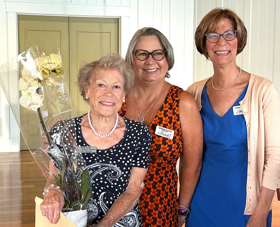 June 20, 2024 – We paid a sincere tribute to Ruth Dull, left, who will be moving out of our area this summer. Ruth is only the sixth Firebelle to receive the Super Firebelle prestigious award. Presenting our thanks were Donna Cloud, center, and Vicki Burkley, right.  (Photo Credit: Nancy Lichtle)